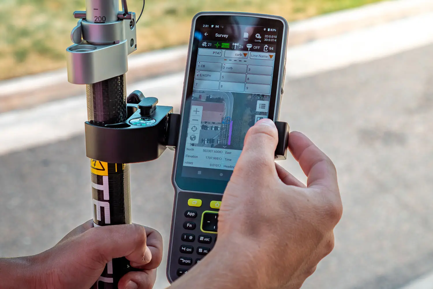 Image of a person using the TC80 attached to a Tersus pole.