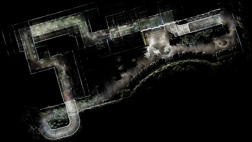 Image of an office building captured by a Tersus MVP S1. Outside cards can be viewed in the parking lot.