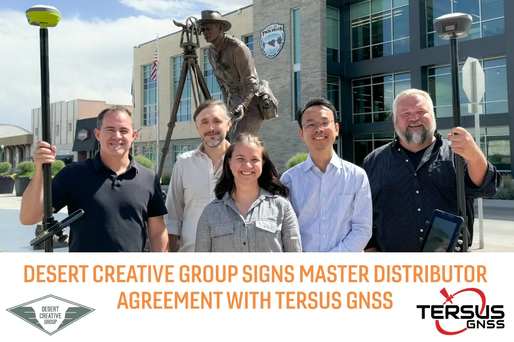 Image of the Desert Creative Group team holding Tersus GNSS Equipment outside of a building labeled "City of Twin Falls". The words "Desert Creative Group signs master distributor agreement with Tersus GNSS" along the bottom of the photo with the DCG Logo and Tersus GNSS Logos on either side.
